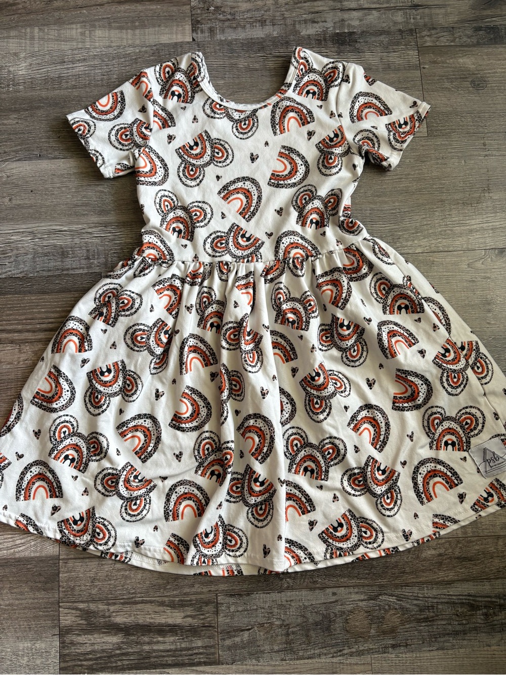 Girls' Cream Dress with Orange Rainbow Motif